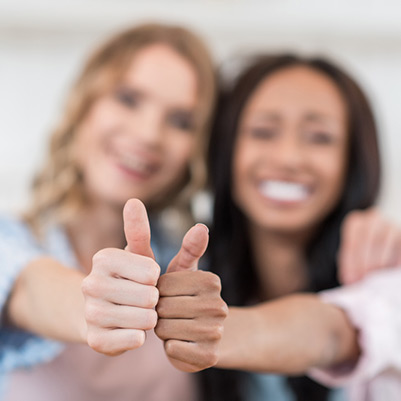 two-women-thumbs-up-testimonials.jpg