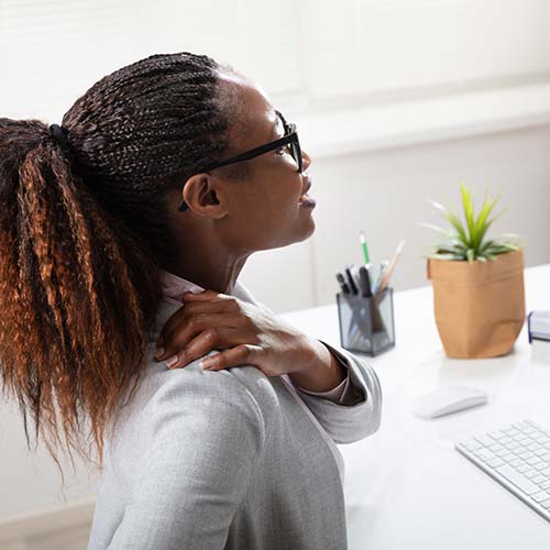 Young-business-woman-with-neck-pain.jpg Young-business-woman-with-neck-pain.jpg