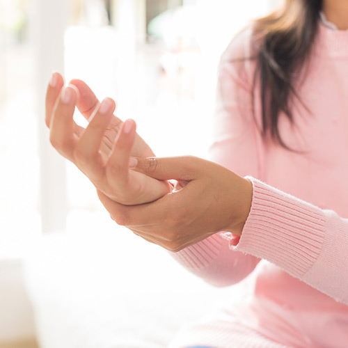 Young-Woman-with-Carpal-Tunnel-Symptoms.jpg Carpal Tunnel Symptoms