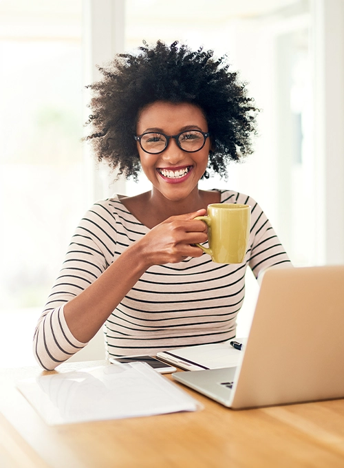 Pain-Free-Woman-At-Computer.webp