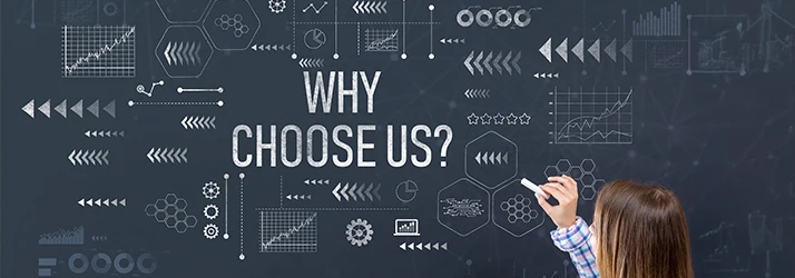 Person writing 'Why Choose Us' emphasizing advantages of functional medicine clinic